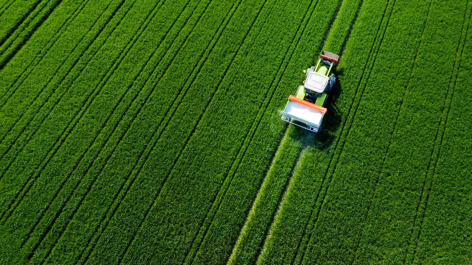 Aerial view of a tractor in a field